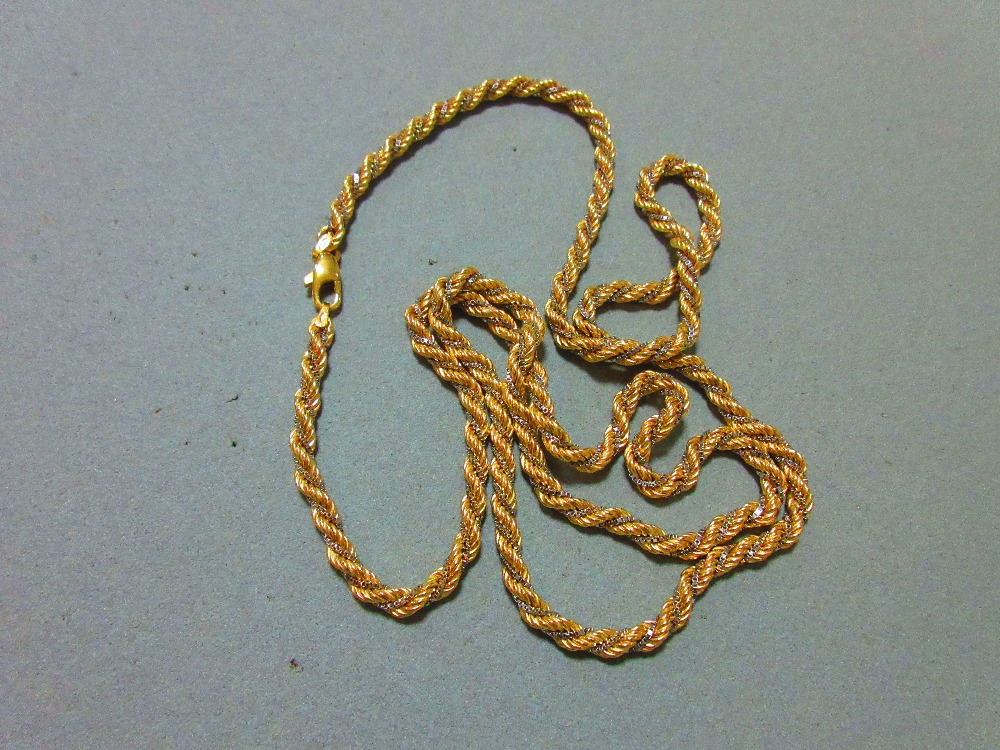 An Italian bi-coloured ropetwist necklace marked for 18ct gold, stamped '750' and with partial - Image 3 of 3