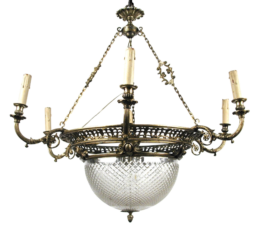 An Edwardian silvered brass and cut glass electrolier, the frame with pierced scrollwork and