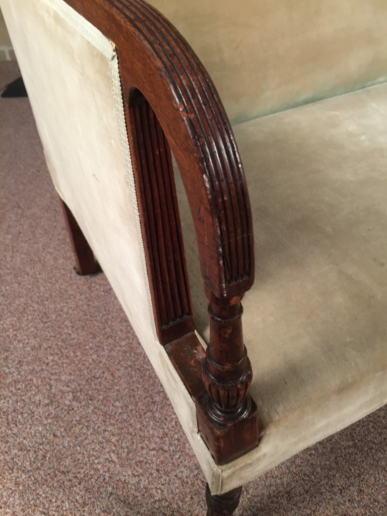 An 18th century mahogany square back sofa, with reeded show wood and open arms, on reeded legs and - Image 2 of 7