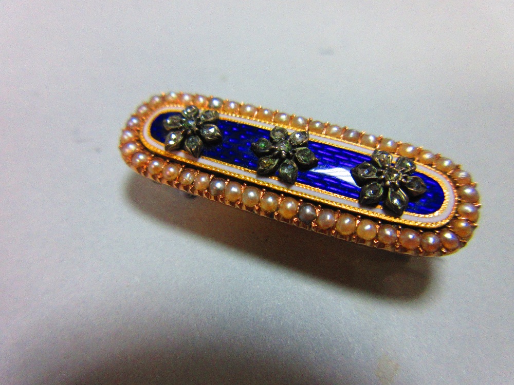 A Georgian diamond, seed pearl and enamel brooch, of elongated oval form and closed back setting,