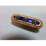 A Georgian diamond, seed pearl and enamel brooch, of elongated oval form and closed back setting,