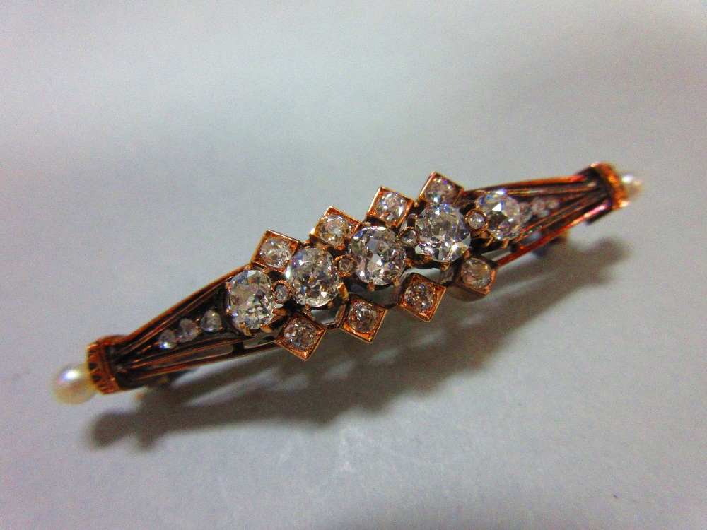 An antique diamond and pearl brooch, designed as a pierced and tapered slightly convex line with - Image 3 of 6