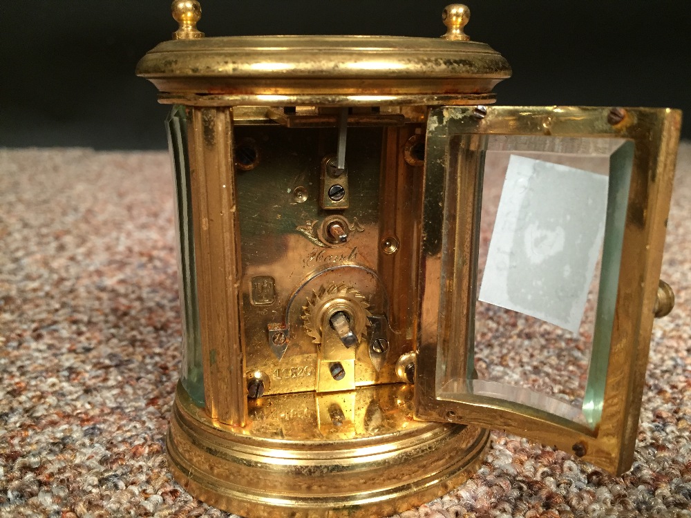 A small gilt brass oval carriage timepiece by Henri Jacot, circa 1890, with silvered 2.5cm (1in) - Image 6 of 6