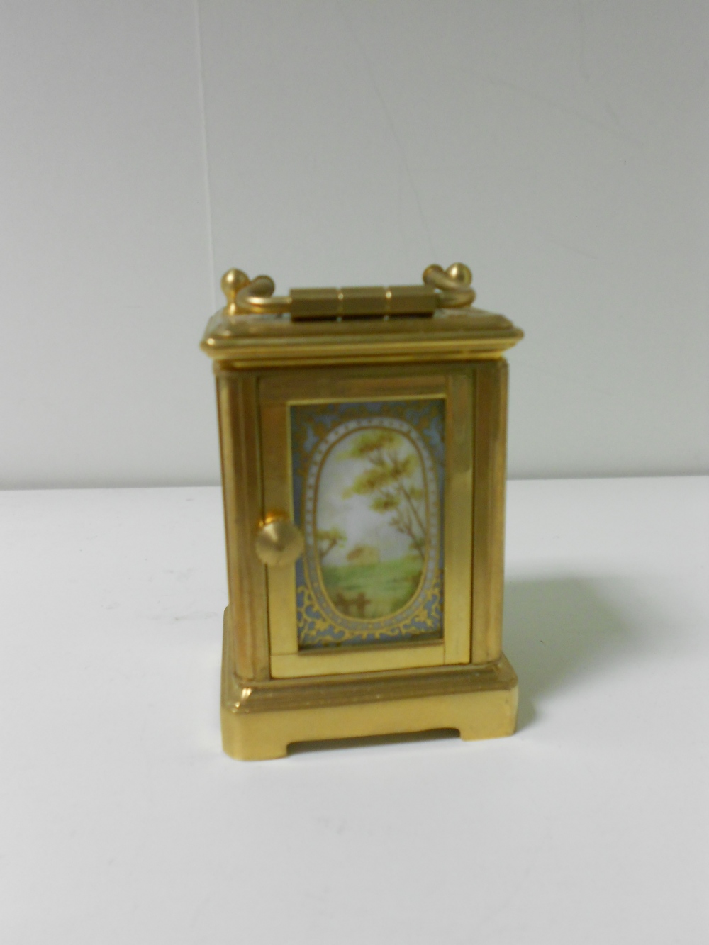 A miniature French porcelain panel gilt brass carriage timepiece, with gilt decorated pale blue - Image 3 of 5