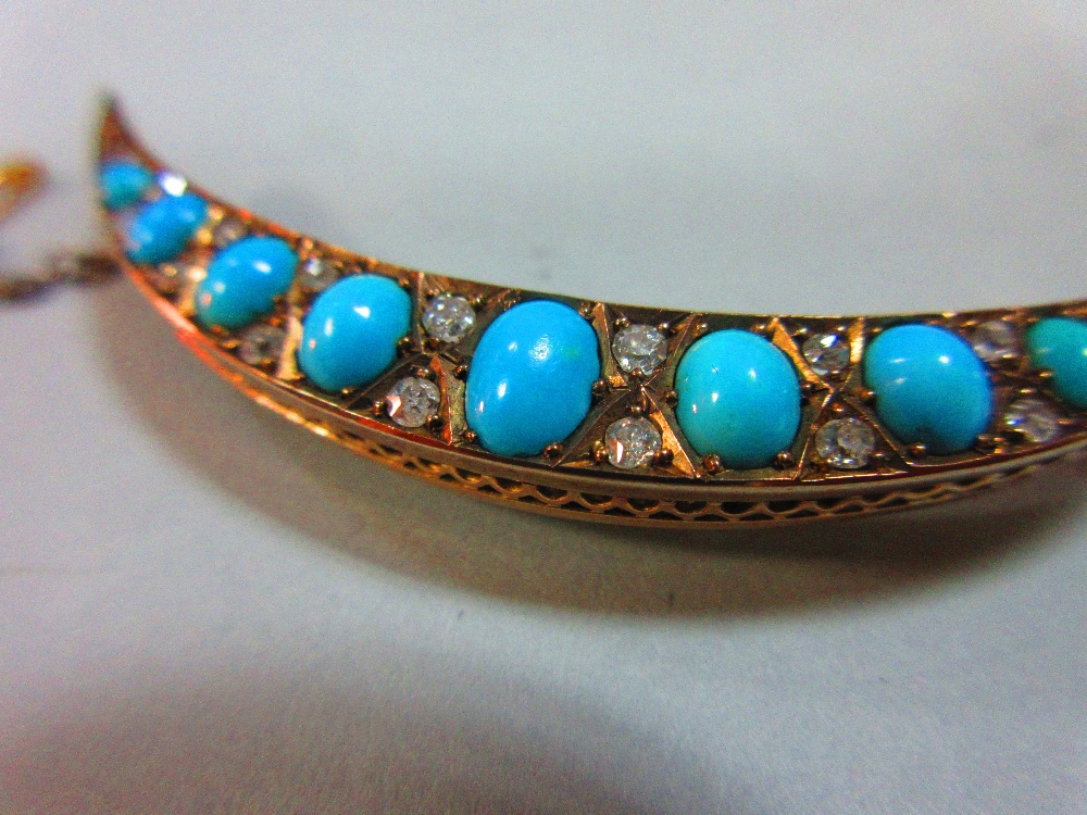 A turquoise and diamond crescent brooch, the open crescent set with graduated oval cabochon - Image 6 of 6