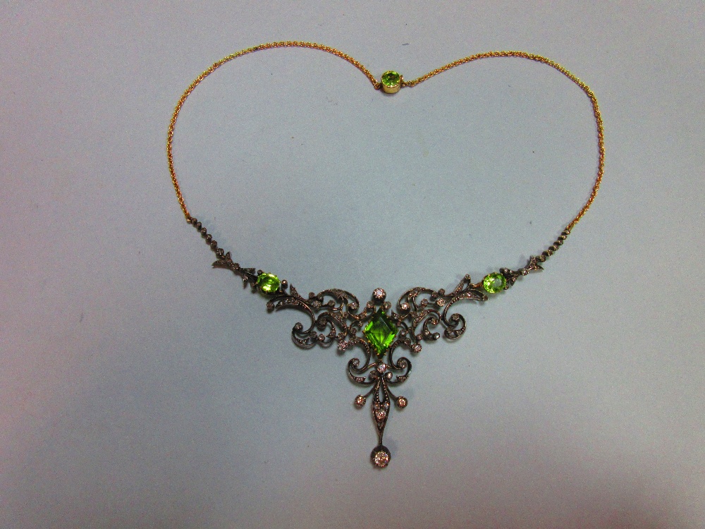 A 19th century peridot and diamond necklace, cased by Tessier, the central feature an open foliate - Image 3 of 8