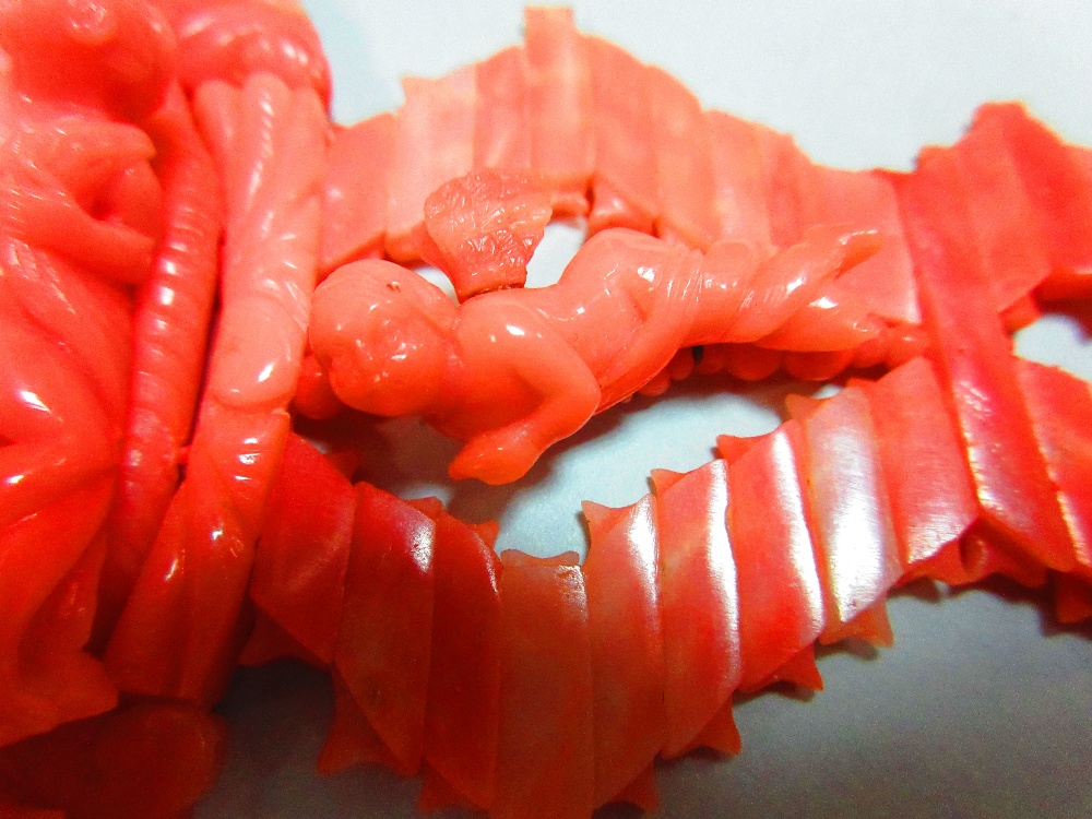 An Italian carved coral choker, designed with a central long oval feature with a fully modelled - Image 2 of 5