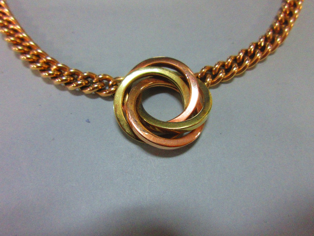 A curb link chain necklace with central knot feature, the knot composed of three square section - Image 2 of 5