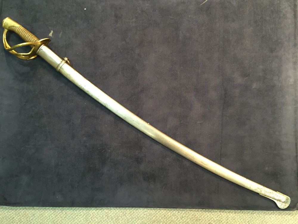 A 19th century French cavalry sword, the blade dated 1877, with brass three loop guard and wire - Image 6 of 6