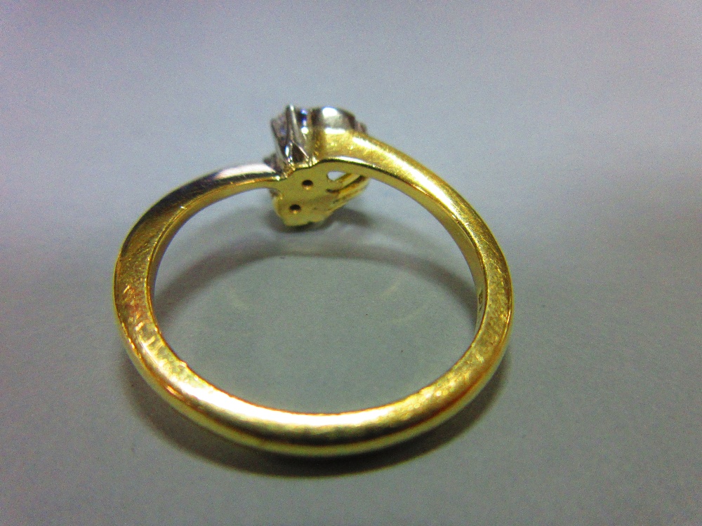 An asymmetric diamond ring set in 18ct gold, designed with two principal round brilliant cut - Image 3 of 5