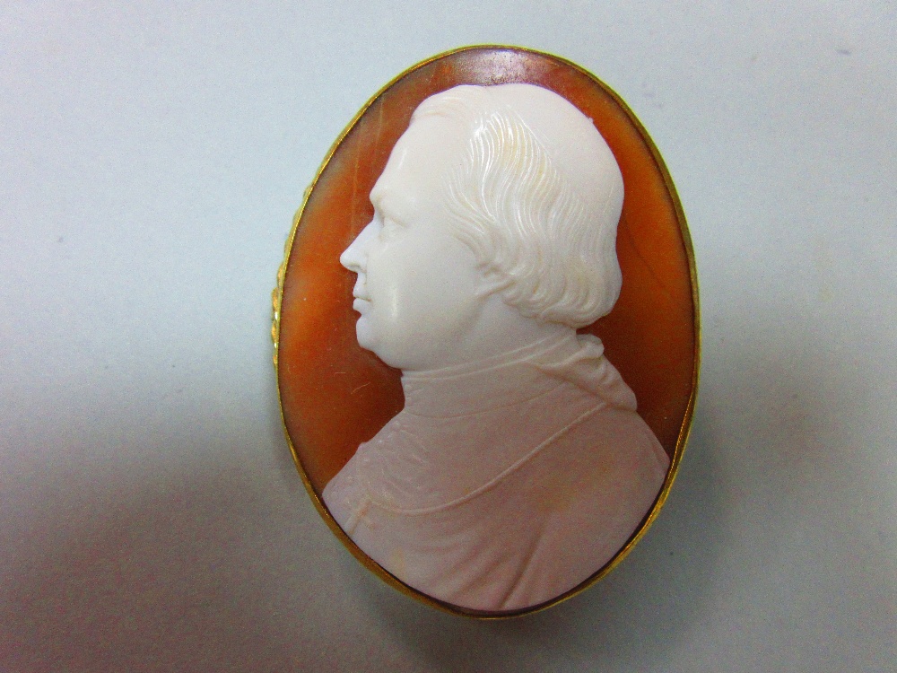A portrait cameo by Tommaso Saulini, the finely carved shell cameo depicting an unidentified