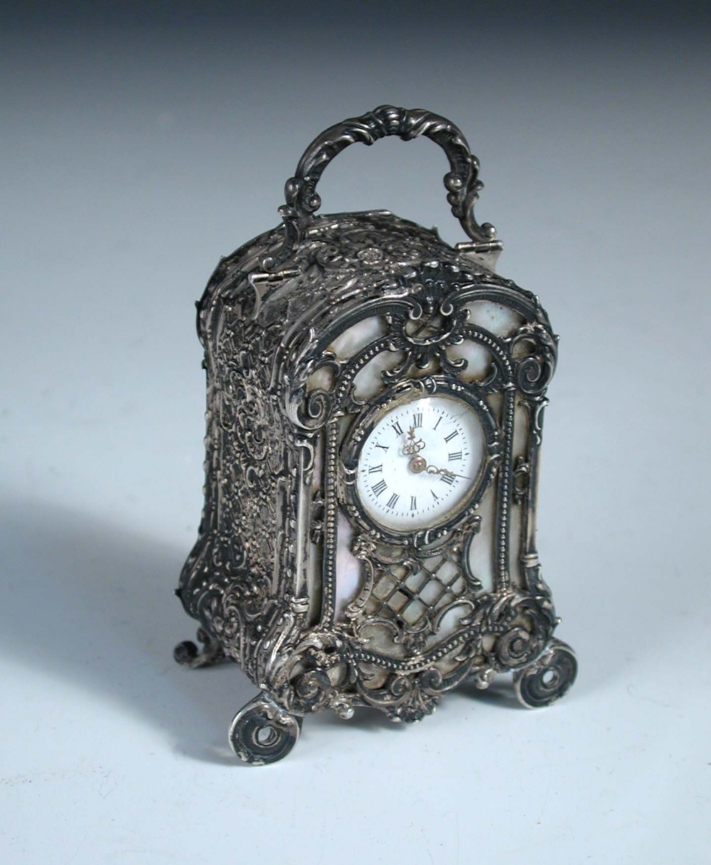 A Continental silver cased miniature carriage timepiece, with inset mother-of-pearl front panels,