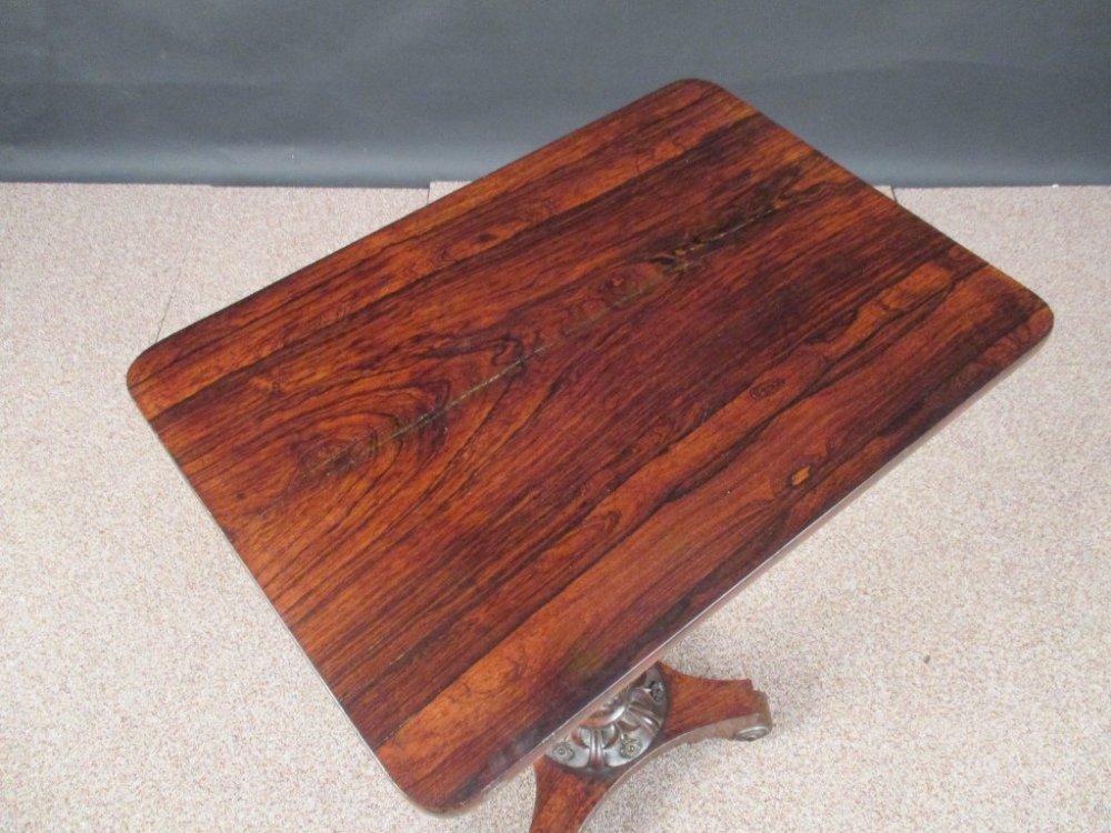 A late Regency rosewood pedestal table, the baluster turned column with carved lapit and foliate - Image 2 of 4