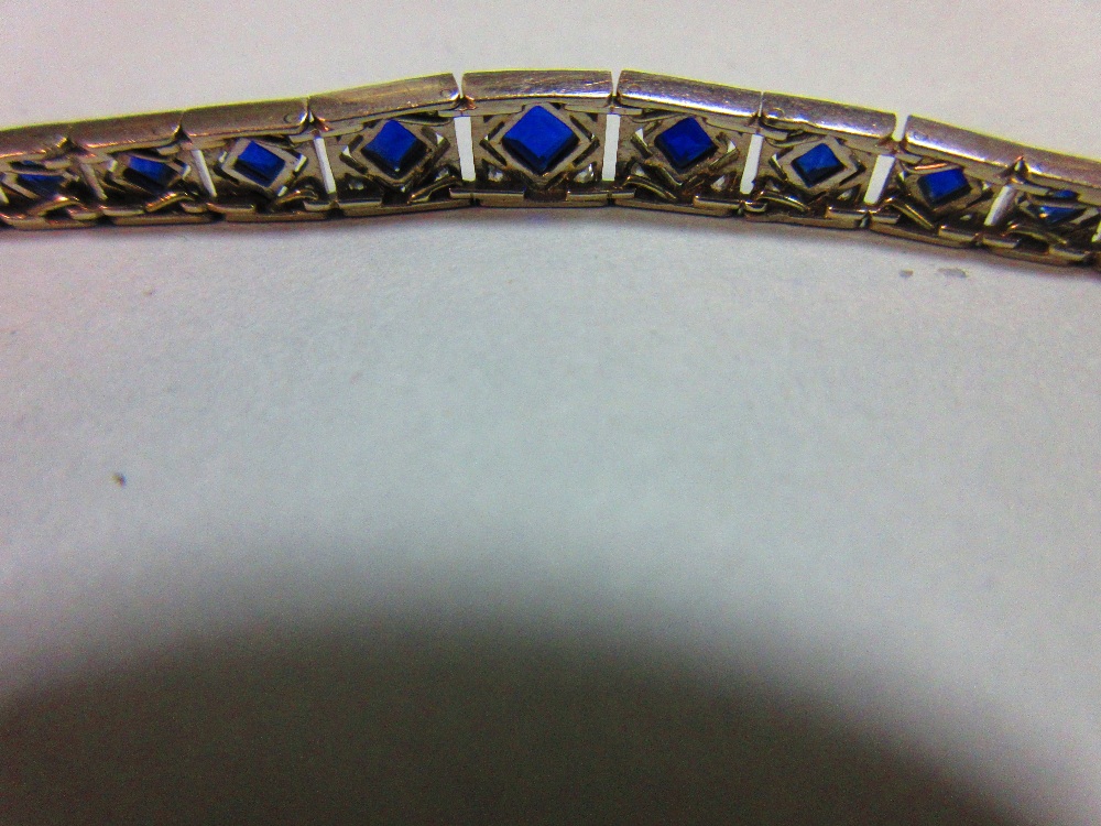 An Art Deco sapphire and diamond bracelet, set to the centre with an articulated and graduated - Image 5 of 5