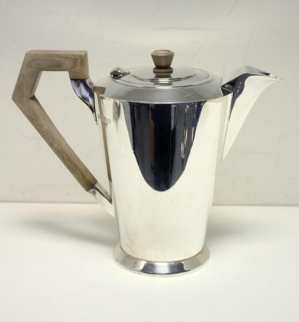 An Art Deco style silver four piece tea set, by The Barker Brothers, Birmingham 1935, comprising a - Image 5 of 9