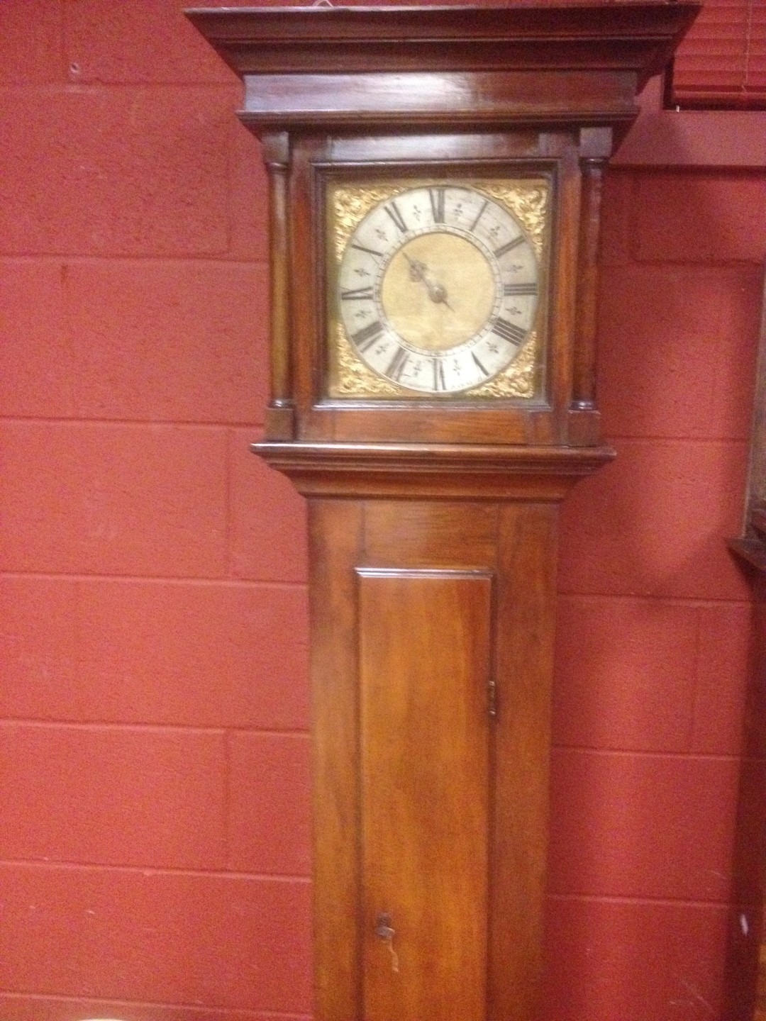 An early 18th century fruitwood longcase clock, the 10inch square brass dial signed 'Thos Steward,