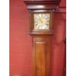 An early 18th century fruitwood longcase clock, the 10inch square brass dial signed 'Thos Steward,