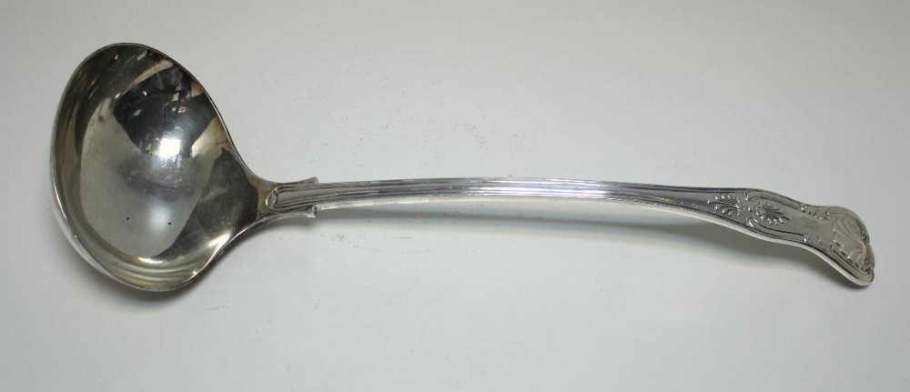 A large silver King's pattern soup ladle, by Roberts and Belk, Sheffield 1911, monogrammed, 33.