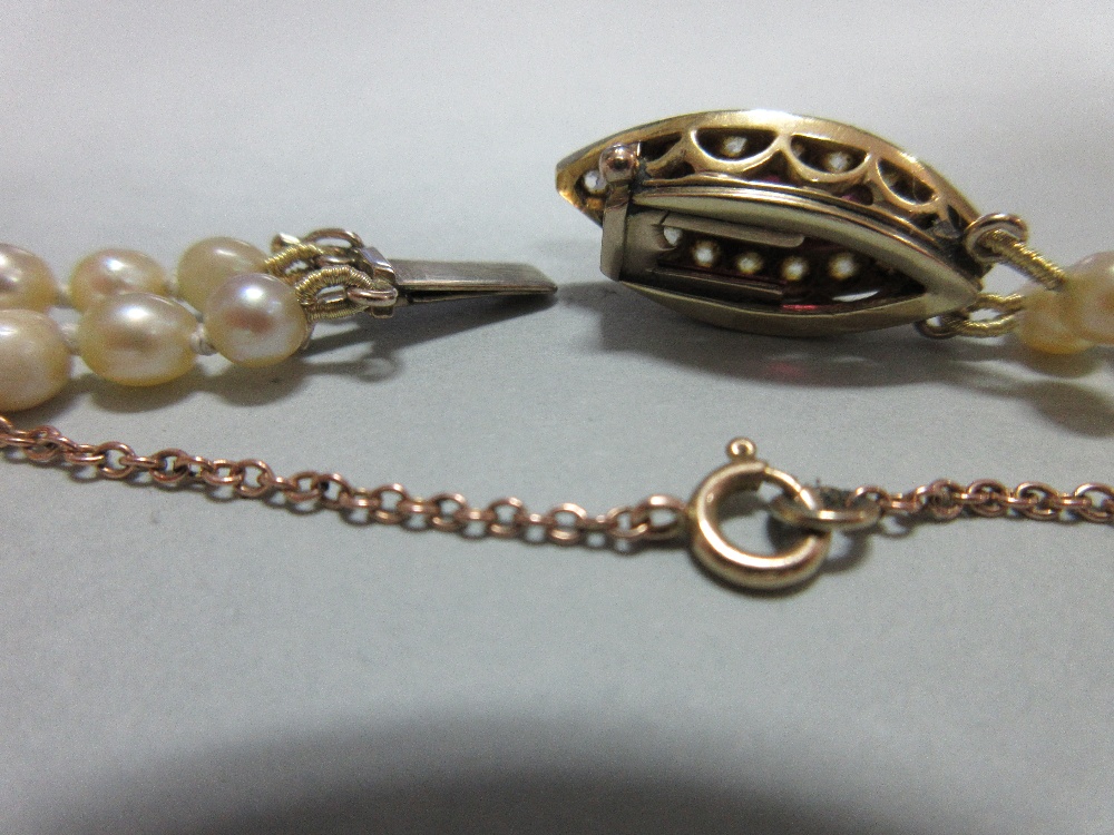 A two row pearl necklace with ruby and diamond clasp, the 3.6 - 8.0mm graduated pearls, to a navette - Image 3 of 7