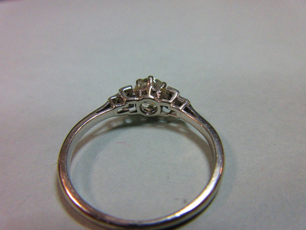 A diamond ring, the old round brilliant cut diamond claw set between stepped square millegrain edged - Image 3 of 5