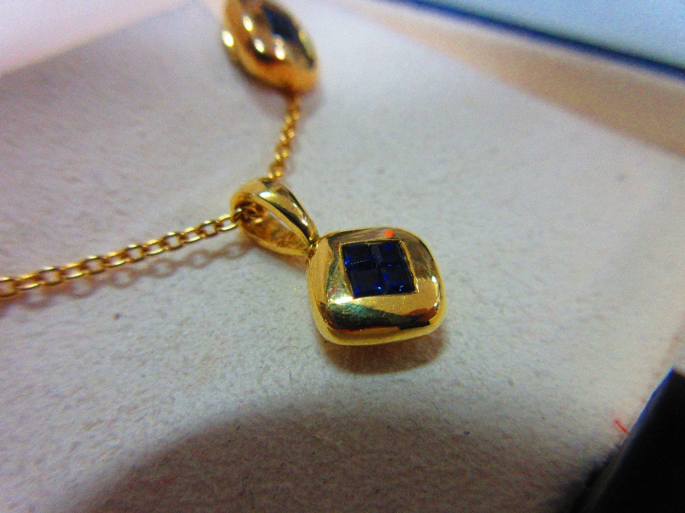 A mystery set sapphire and 18ct gold suite of pendant and earstuds by Wempe, the pendant and each - Image 6 of 6