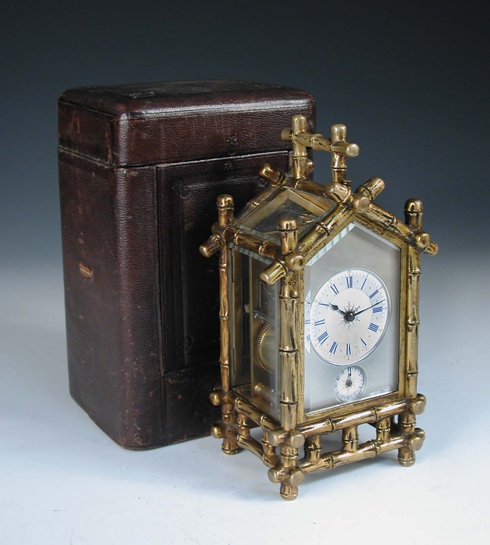 A gilt brass bamboo case carriage clock, circa 1890, with repeat and alarm, silvered platfom lever