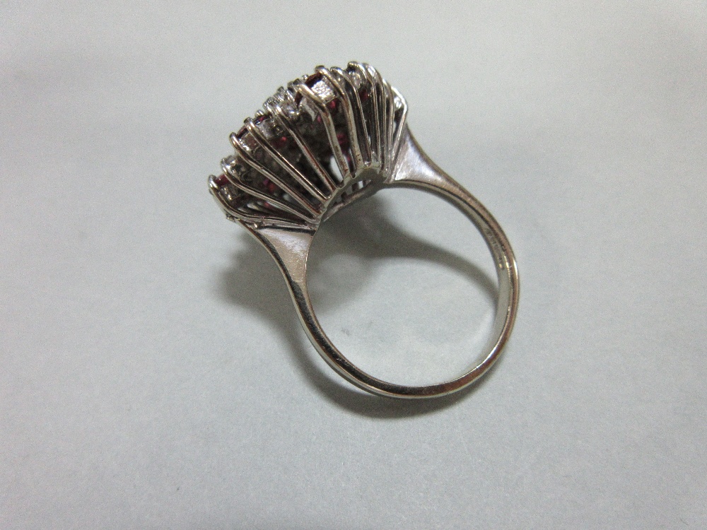 A ruby and diamond cluster ring in 18ct white gold, designed as a densely set diaper with a - Image 5 of 6