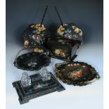 A collection of 19th century papier maché wares, comprising tea caddy, desk stand with mother-of-