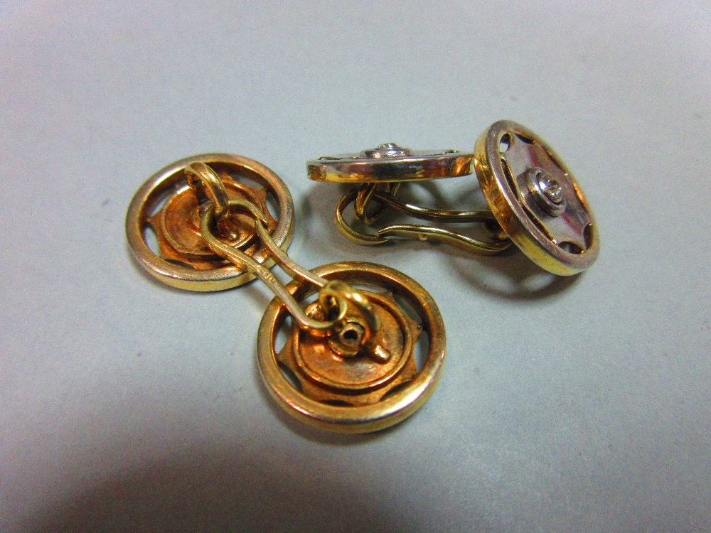 A pair of diamond set double ended cufflinks, each 1.5cm diameter end designed as a stylised wheel - Image 4 of 4