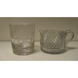 An 'Oddfellows' tumbler and a cream jug, possibly Irish, the tapering cylindrical sides of the