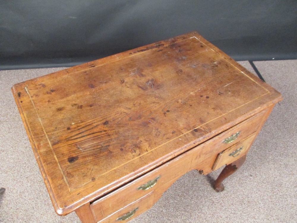 An early 18th century oak lowboy, boxwood line inlaid border decoration, fitted one long and two - Image 2 of 5