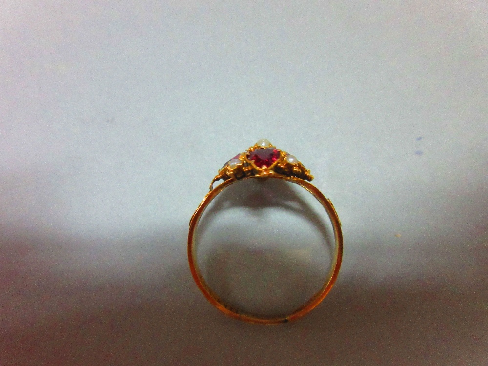 A mid Victorian 15ct gold, garnet and seed pearl quatrefoil ring, with four heart cut almandine - Image 6 of 6