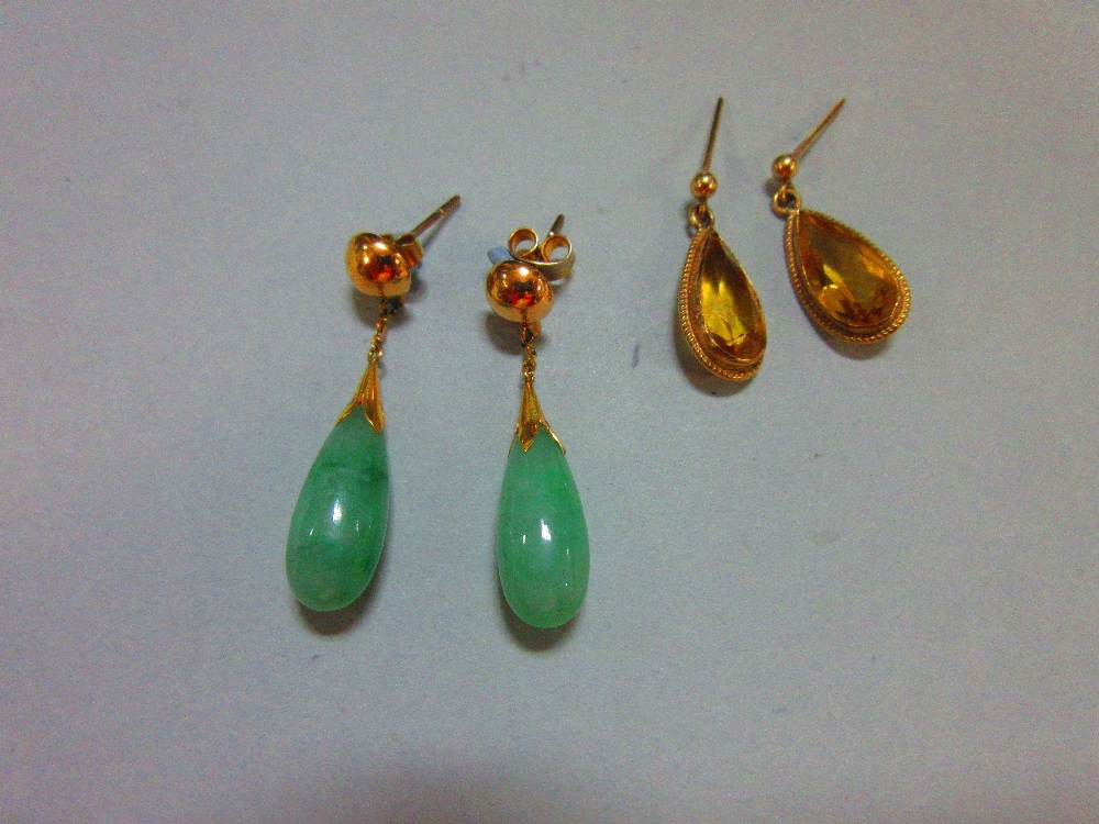 A pair of jade drop earpendants (with 1975 insurance assessment from Liberty) together with a pair