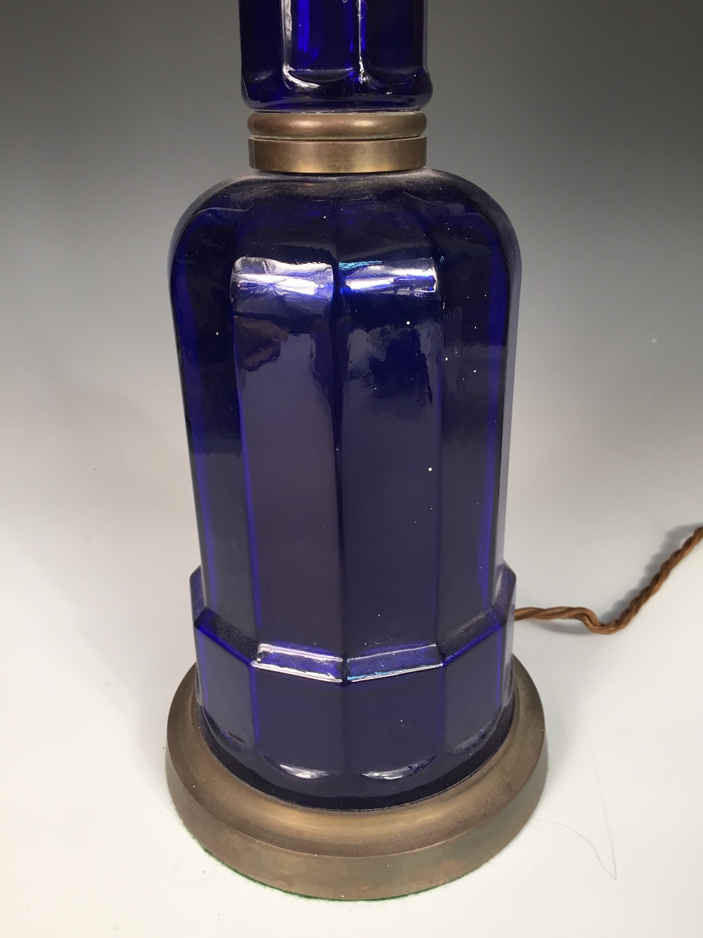 A Victorian blue glass table lamp, the octagonal column above a broad base and brass mounts, - Image 2 of 3