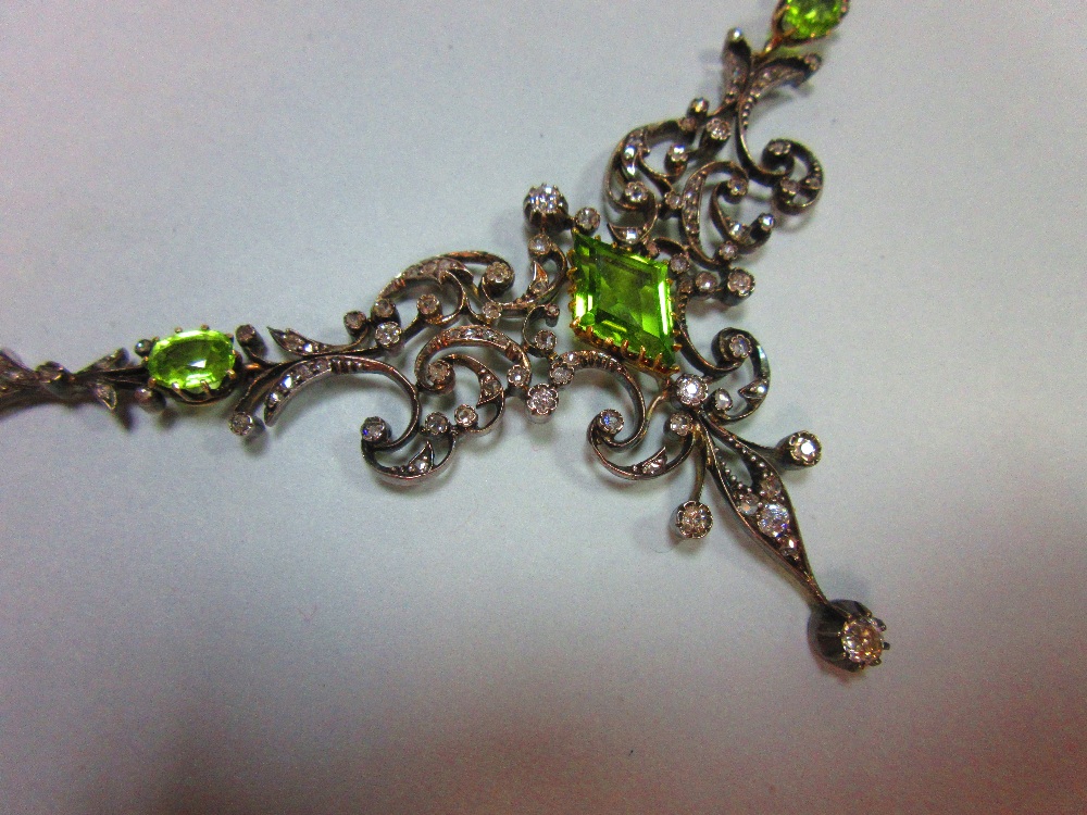 A 19th century peridot and diamond necklace, cased by Tessier, the central feature an open foliate - Image 4 of 8
