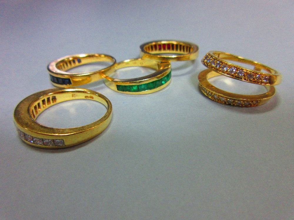 An interchangeable diamond, ruby, emerald and sapphire half band eternity ring, with four - Image 3 of 7