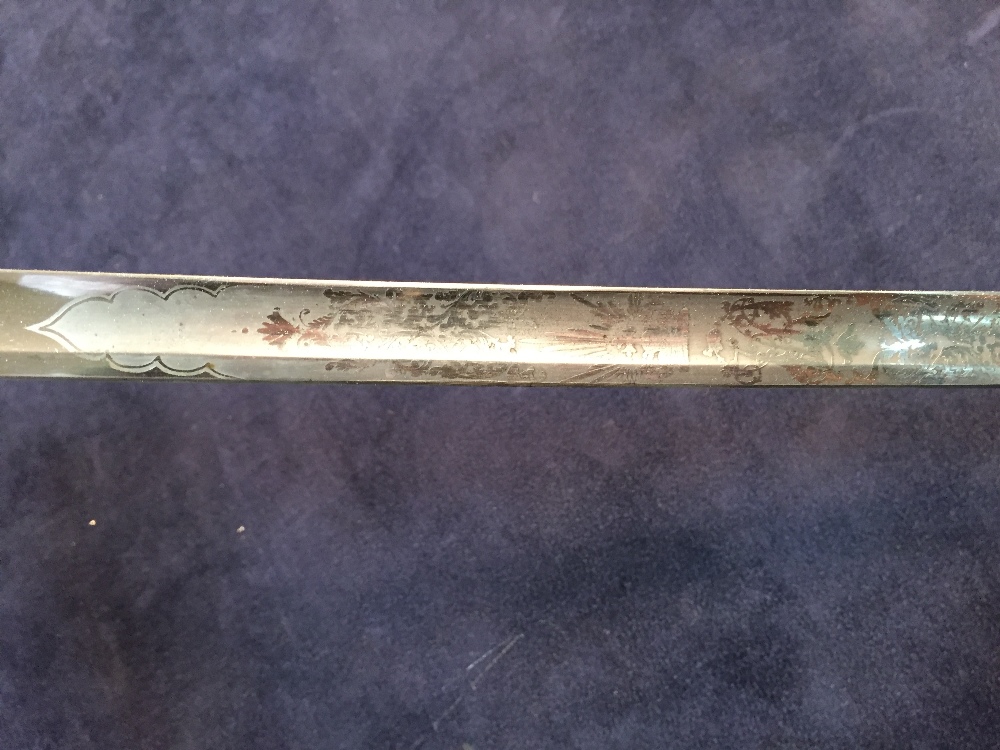 A Victorian officer's dress sword, with etched blade, unsigned, VR ciphers, pierced guard with - Image 3 of 4