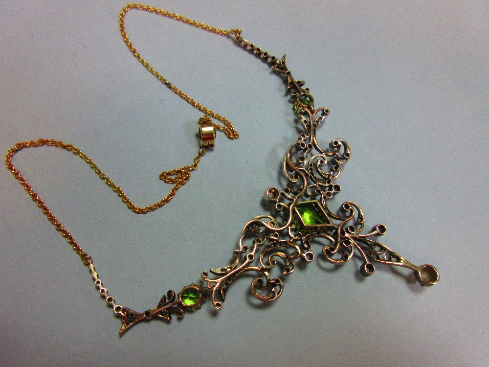 A 19th century peridot and diamond necklace, cased by Tessier, the central feature an open foliate - Image 6 of 8