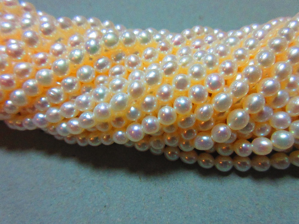 A skein of thirty six strings of 4mm cultured pearls, each string 40.5cm long (one string of - Image 3 of 3