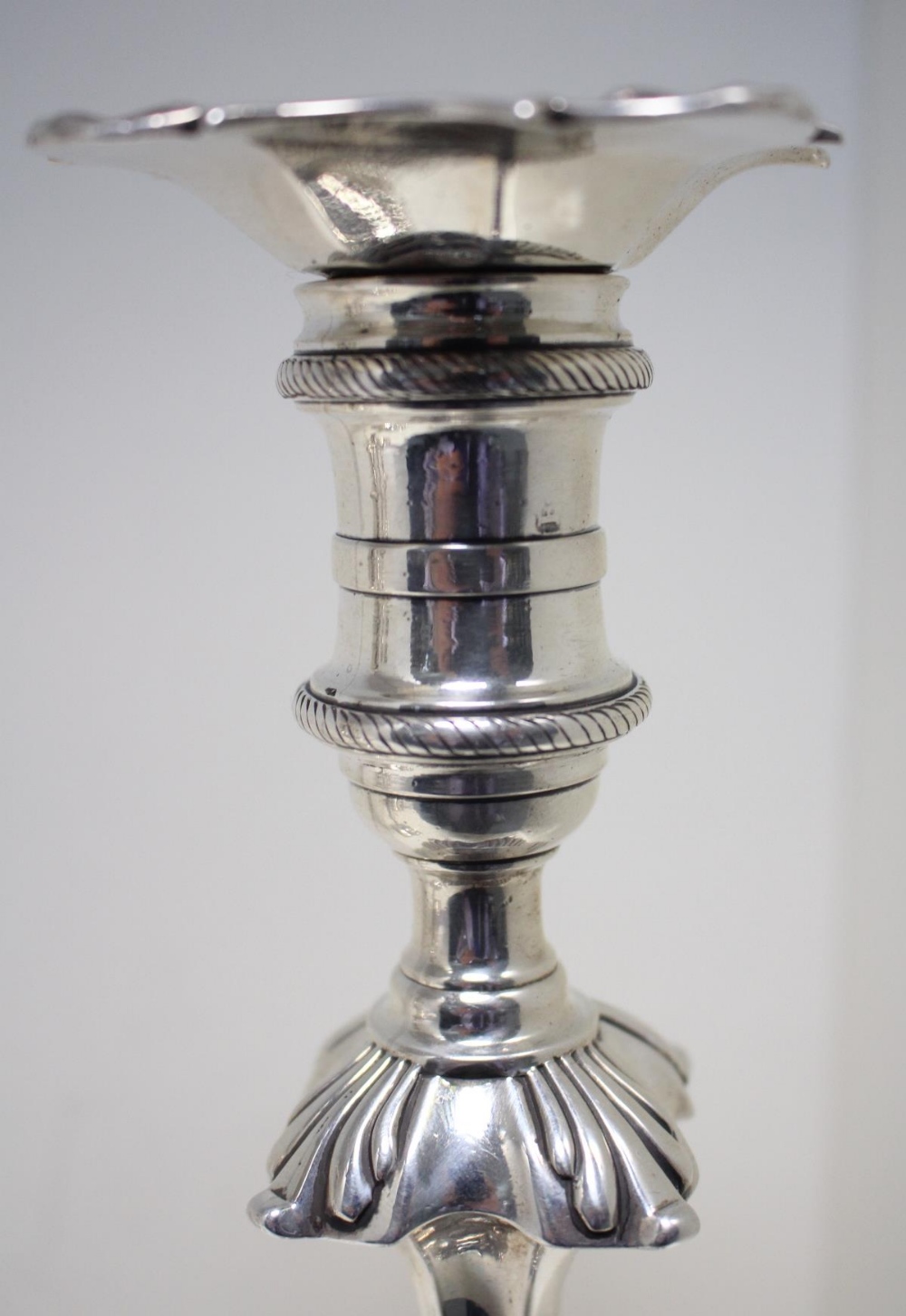 Two pairs of silver candlesticks, by Ebenezer Coker, London 1766/1767, each raised from a square - Image 11 of 11