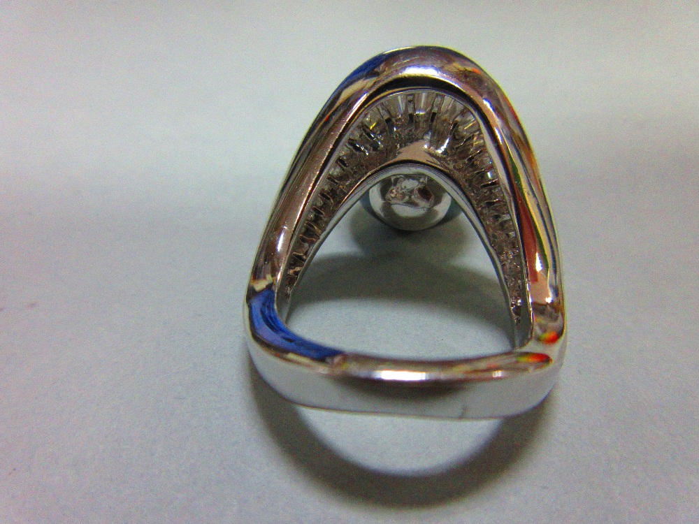 A black pearl and diamond ring, with a wishbone design channel set with graduated baguette cut - Image 4 of 5