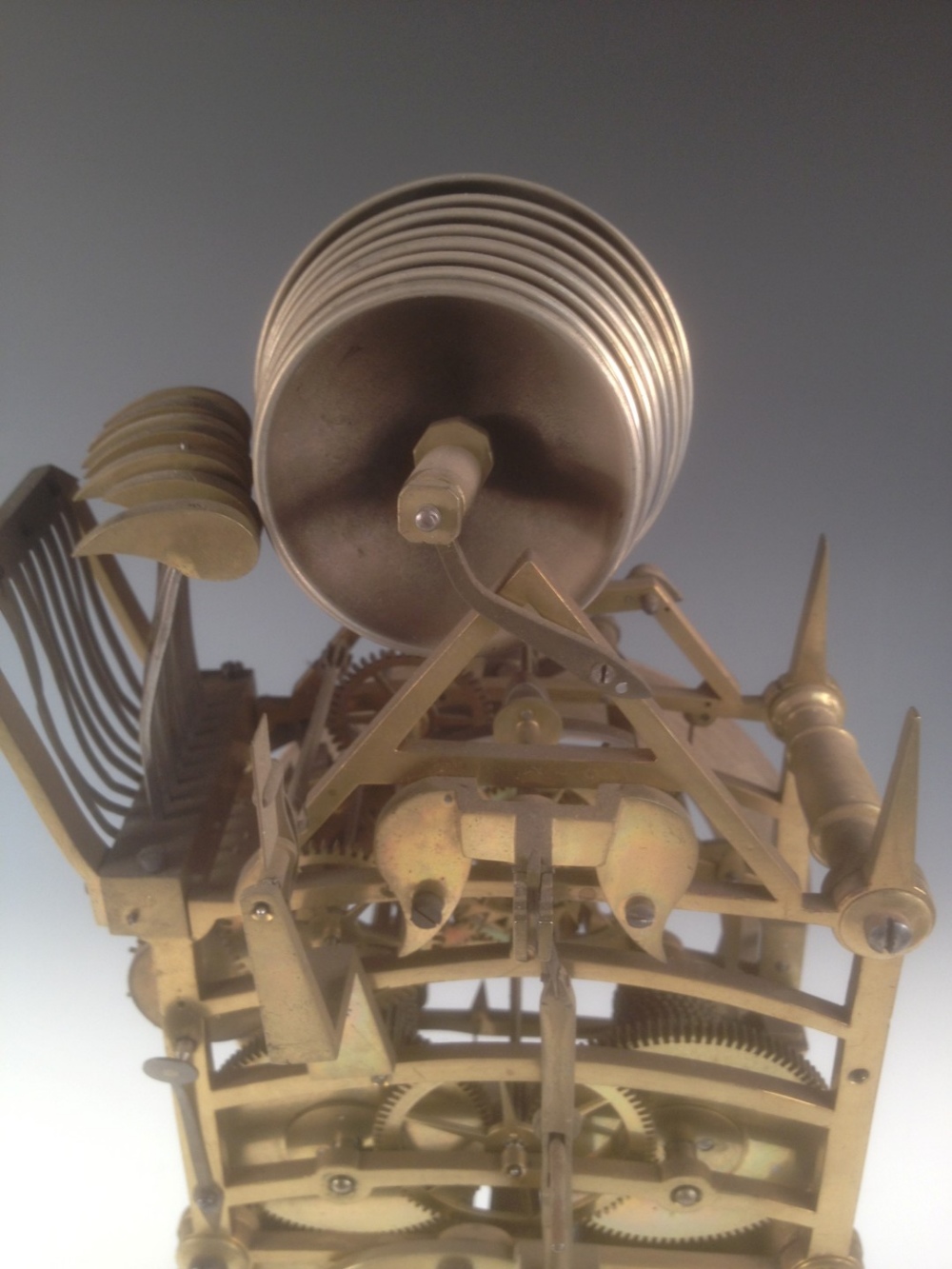 A Victorian brass bell chiming skeleton clock, the four tapering column legs supporting the twin - Image 6 of 6