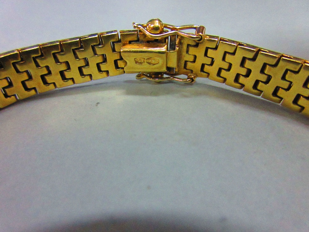 An Italian 18ct tri-coloured gold bracelet, the smooth ribbon of interlocking white, rose and yellow - Image 3 of 5