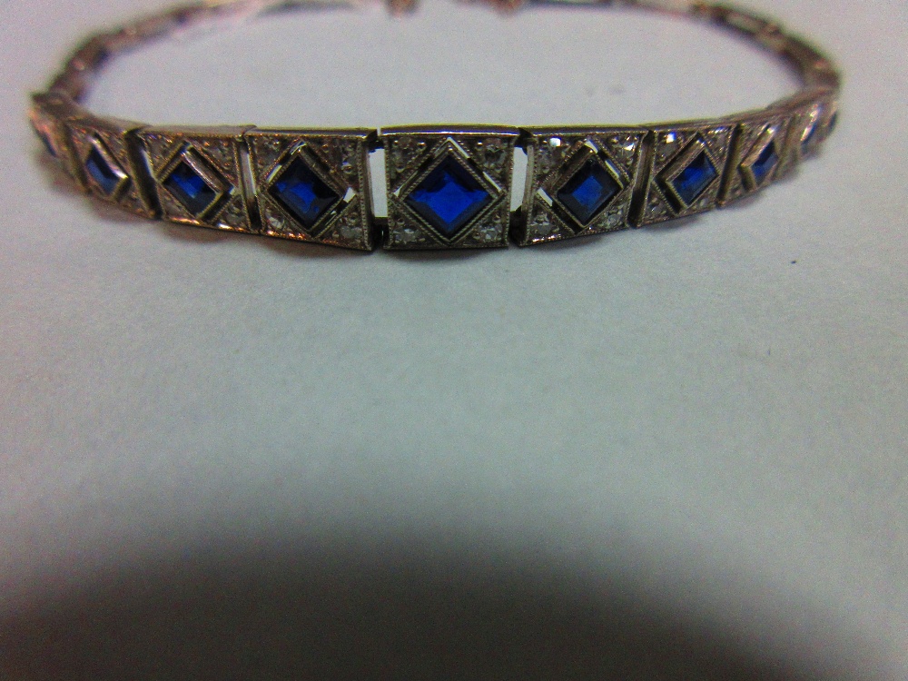 An Art Deco sapphire and diamond bracelet, set to the centre with an articulated and graduated - Image 4 of 5