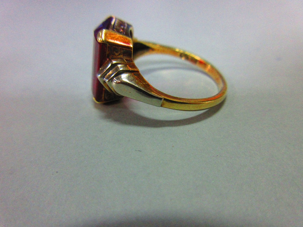 An Austrian single stone synthetic red spinel ring, the fancy cut rectangular pinky-red spinel, claw - Image 3 of 8