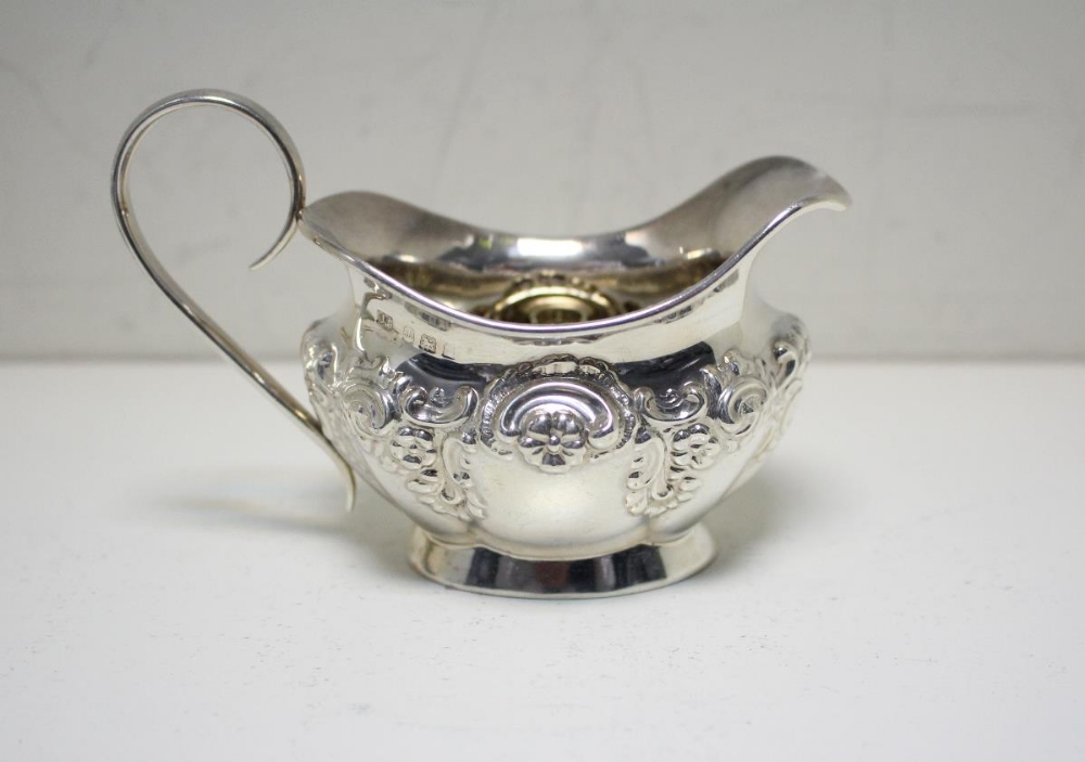 A small silver sauce boat, by Collingwood & Sons Ltd, Birmingham 1935, of oval panelled form - Image 8 of 9