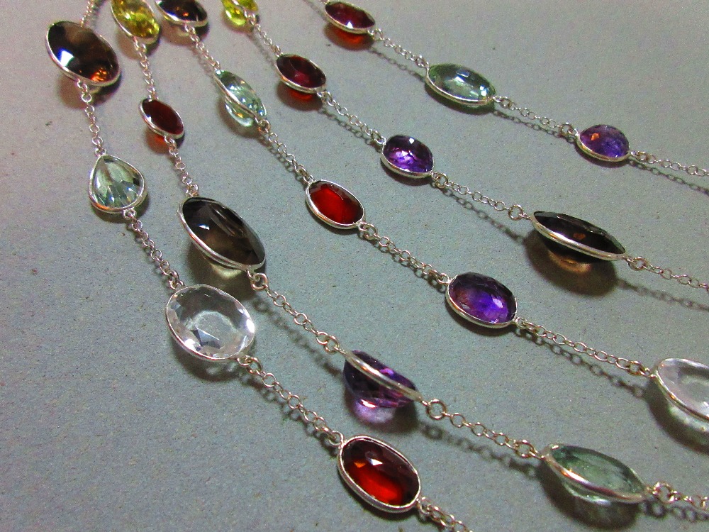 A five strand multi gemset necklace, composed of oval cut hessonite garnets, prasiolites, amethysts, - Image 2 of 7