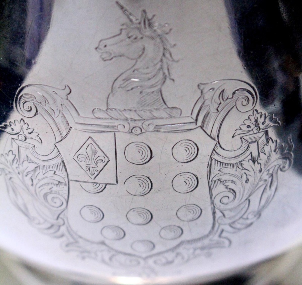 A George II silver ale jug, by Jonathan Fossy, London 1742, of plain baluster form over a - Image 3 of 5