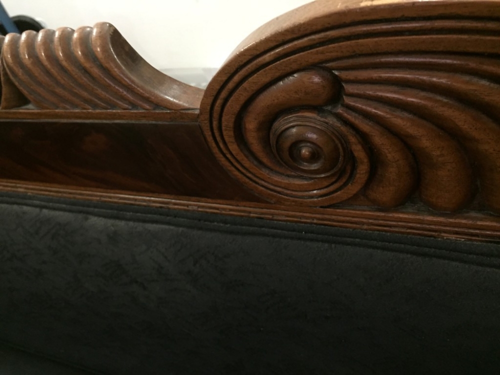 A late Regency mahogany sofa, scroll and gadroon carved show wood, upholstered in a black fabric - Image 2 of 4