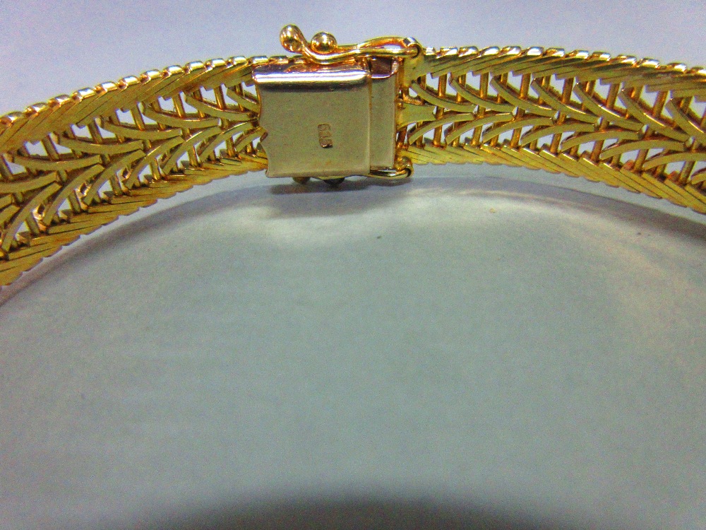 An Austrian 14ct gold bracelet, the delicate pierced polished and textured ribbon band, width 1cm, - Image 3 of 5